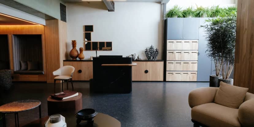 Modern concierge desk at Colima 71 hotel, ideal for boutique corporate event check-in.