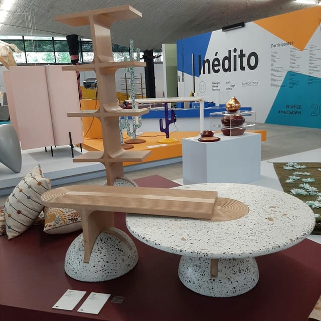 Modern trade show vignette with mixed-material furniture for brand activation and conferences.
