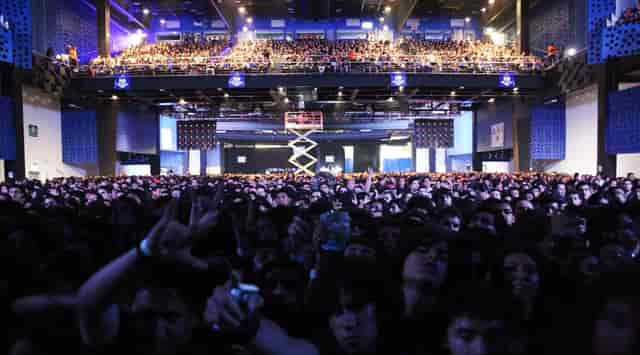 Crowded Pepsi Center concert hall during a sold-out live music event.