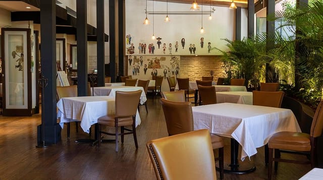 Elegant Restaurant in The Palm with leather seating for corporate luncheons and private dinners.