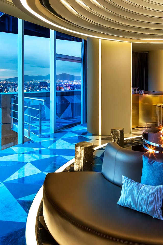 Modern W Mexico City suite venue featuring skyline views for corporate events and VIP receptions.