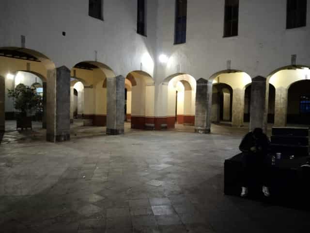 Historic Patios de San Jerónimo event space, atmospheric architecture for cocktail receptions.