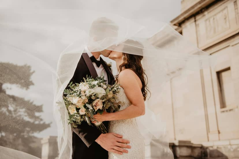 Luxury wedding portrait with veil at La Quinta Imperial ballroom venue.