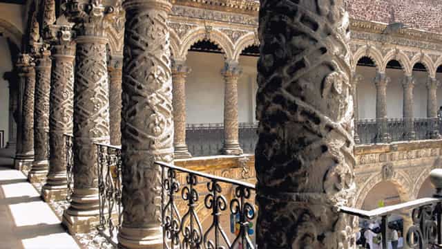 Historic La Merced Cloister with tiered stonework, perfect for upscale gala and cocktail events.