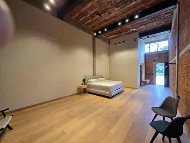Industrial venue with exposed brick, perfect for pop-up events and brand activations.