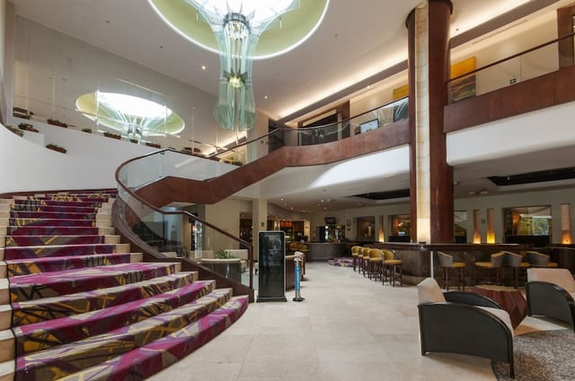 BelAir Unique hotel lobby with sweeping staircase for corporate events and conference registration.