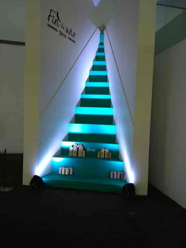 Banquetes Mayita experiential marketing installation with dramatic lighting for corporate events.