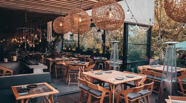 Fiera Rooftop venue with warm ambient lighting for corporate dinners and social mixers.