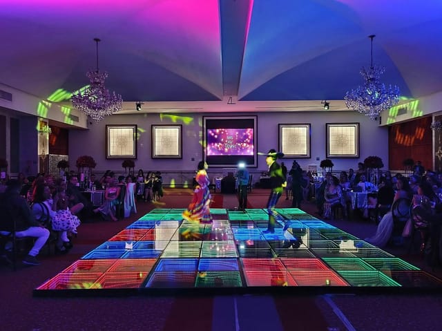 LED dance floor at Terraza Le Crillon evening gala for corporate event production.
