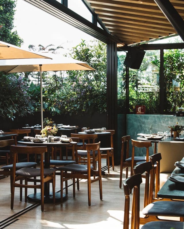 Madre Roof bar featuring natural decor for corporate luncheons and VIP networking events.