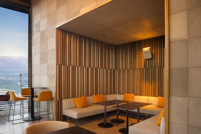 Modern Cityzen rooftop bar booth seating for upscale networking and corporate events.