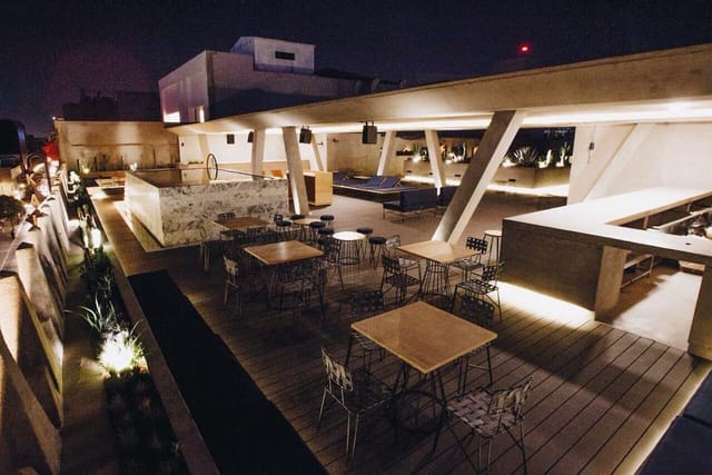 Malaquita Rooftop bar with ambient lighting for upscale cocktail receptions and networking events.