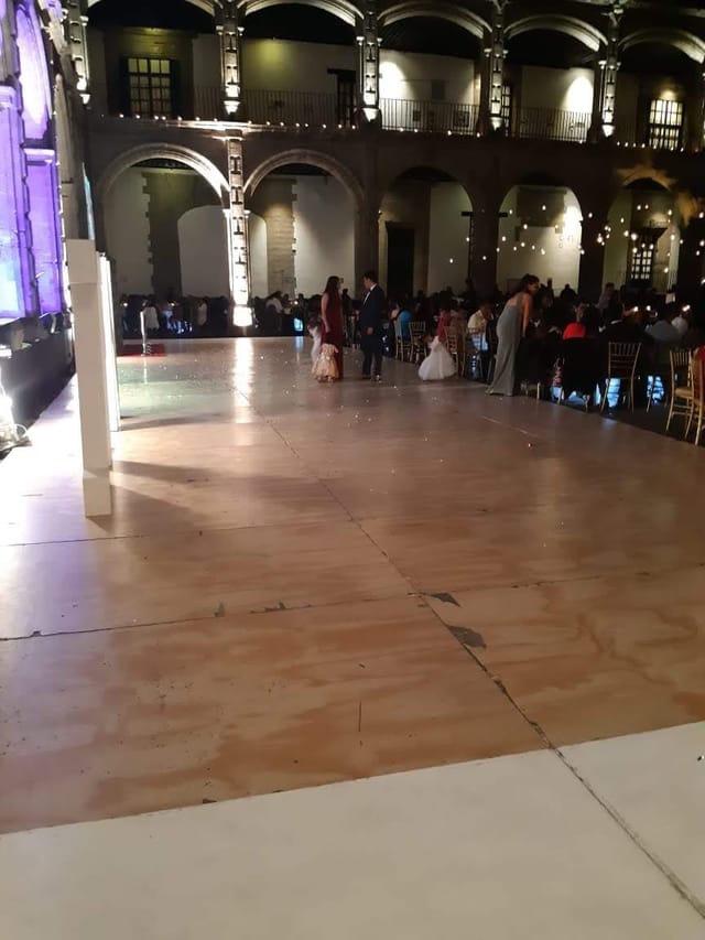 Plywood stage setup in Ex Convento San Hipólito event venue, ideal for rustic weddings or parties.