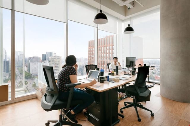 Private breakout office in WRK with skyline views for productive meetings and corporate events.