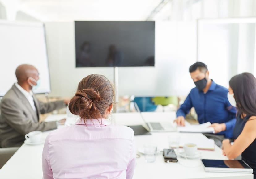 Hybrid boardroom at WRK with physical distancing for corporate meetings and team collaboration.