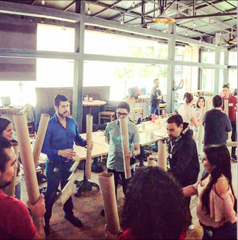 Team-building workshop at Terraza, featuring collaborative props in a modern event space.