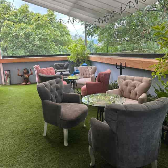 Modern landscaped terrace lounge for professional networking and corporate breakout events.