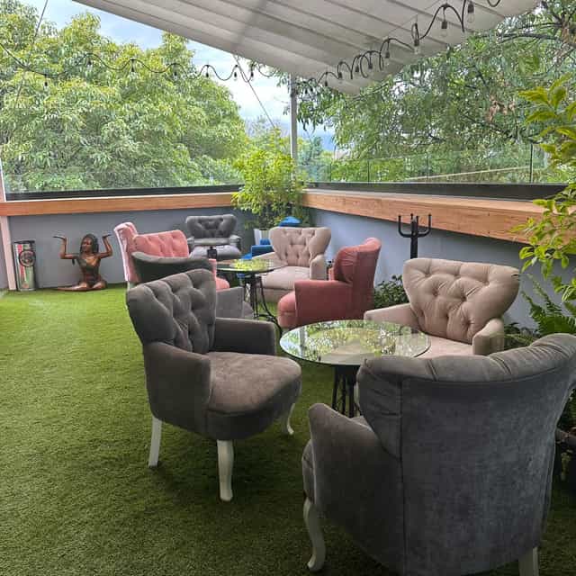 Modern landscaped terrace lounge for professional networking and corporate breakout events.
