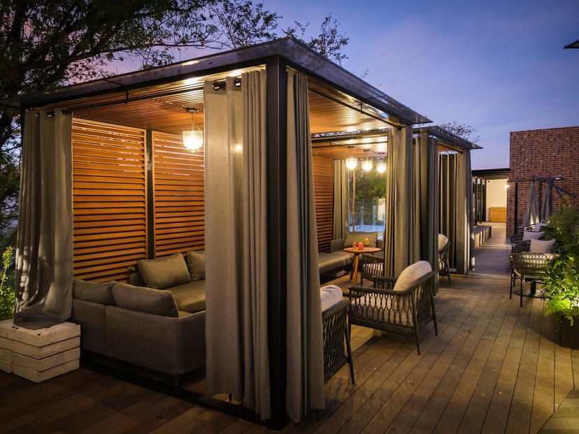 Cocktail reception at Kimpton Virgilio featuring upscale modular cabanas for VIP networking events.