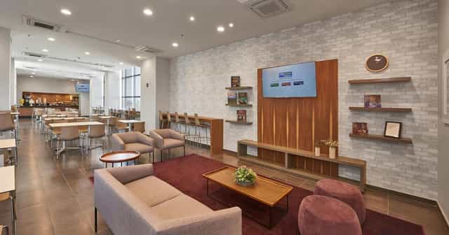 City Express Marriott Ciudad De México event space with lounge seating for corporate meetings.