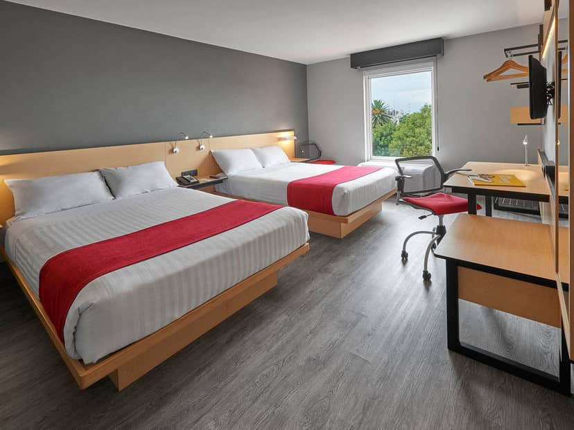 Double occupancy hotel room at City Express CDMX La Raza, ideal for event lodging and group travel.