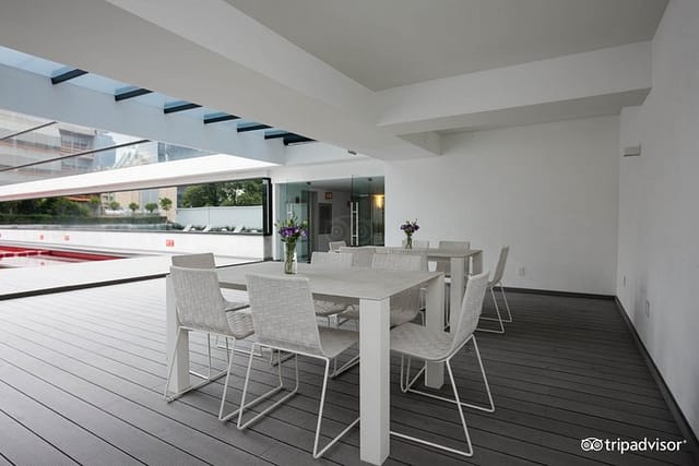 Poolside Terrace at NH Collection Mexico City: Covered outdoor venue for corporate event meetings.