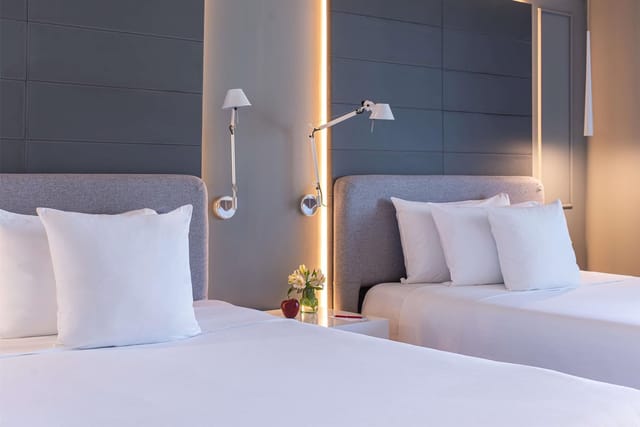 Modern twin room at NH Collection Mexico City Reforma for corporate events and business travel.