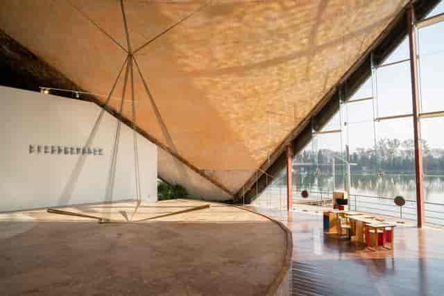 Minimalist stage at LagoAlgo cultural center for exclusive gallery events and product reveals.