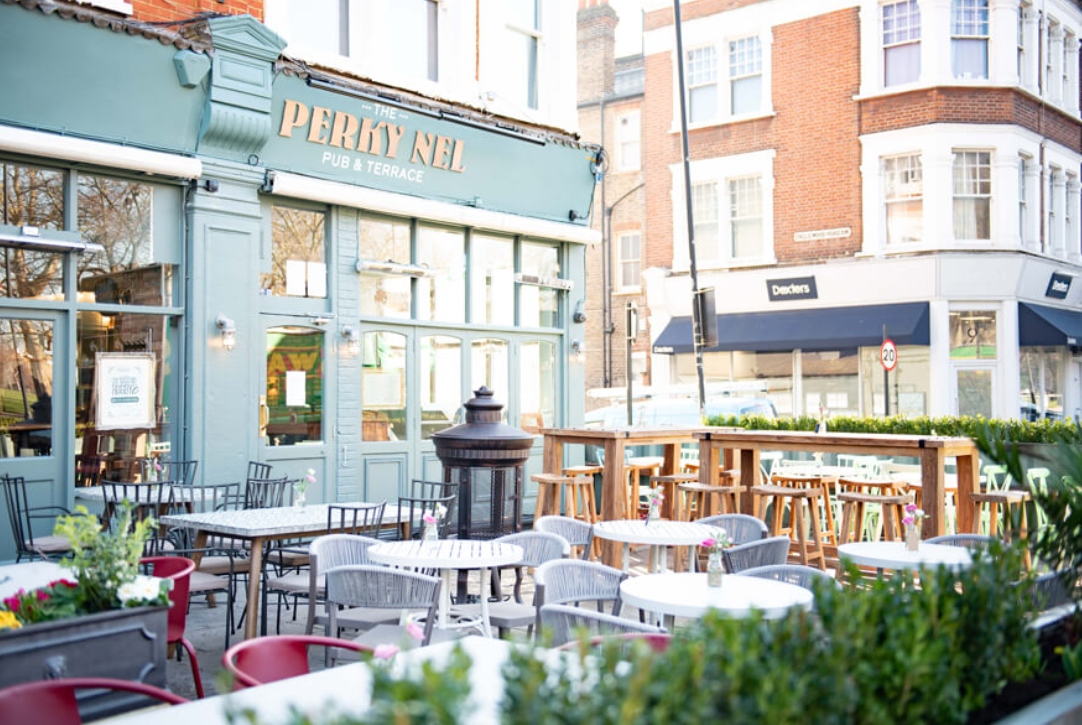 Outdoor dining area at The Nel, ideal for casual meetings and networking events.