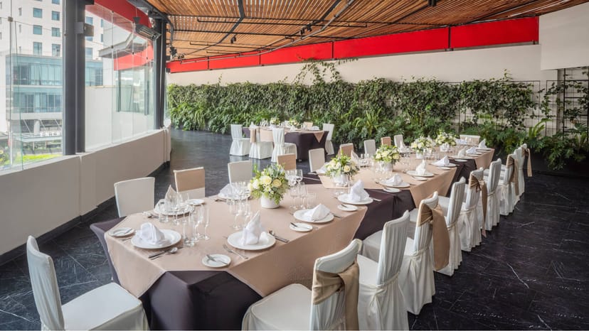Paragon Hotel meeting room with living wall for social luncheon or rehearsal dinner venue.