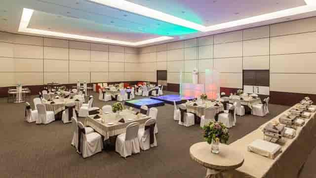NH Restaurant ballroom with buffet setup for corporate events and social banquet catering.