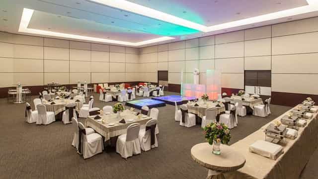 NH Restaurant ballroom with buffet setup for corporate events and social banquet catering.