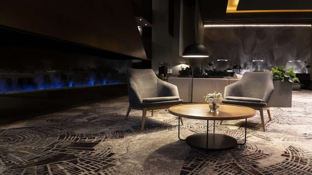 Executive suite for private business meetings, upscale breakout space at NH Collection Airport.