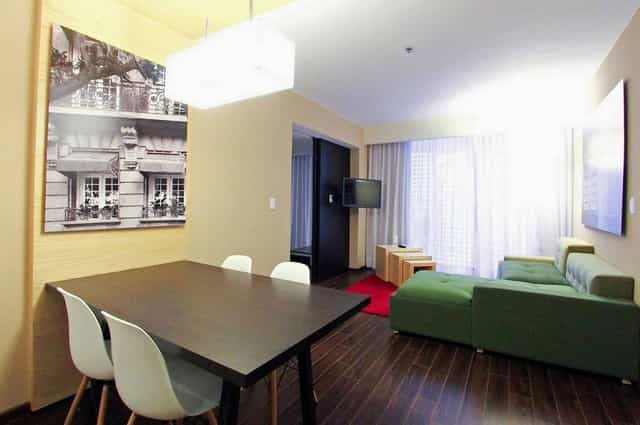 Fiesta Inn Insurgentes studio suite for executive meetings and corporate breakout sessions.