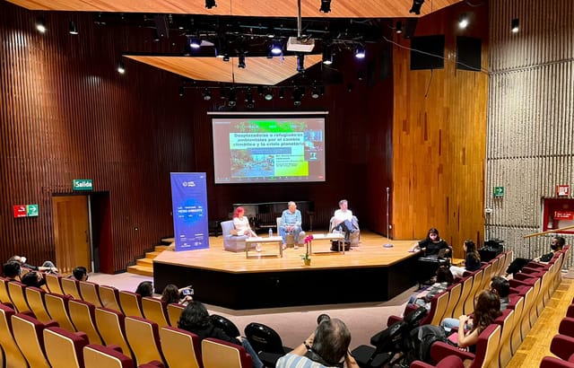 Panel discussion at Sala Carlos Chávez auditorium for professional events and conferences.