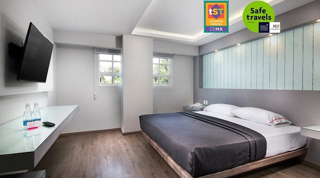 Modern hotel suite in Mexico City with workspace for business travel and event accommodation.