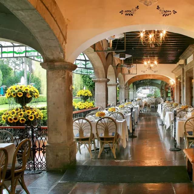 Colonial arch event space in Antigua Hacienda de Tlalpan for rehearsal dinners and luncheons.