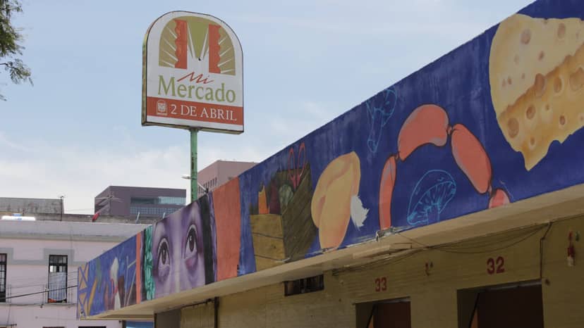 Mercado 2 de Abril exterior, vibrant local market venue for culinary tours and cultural events.