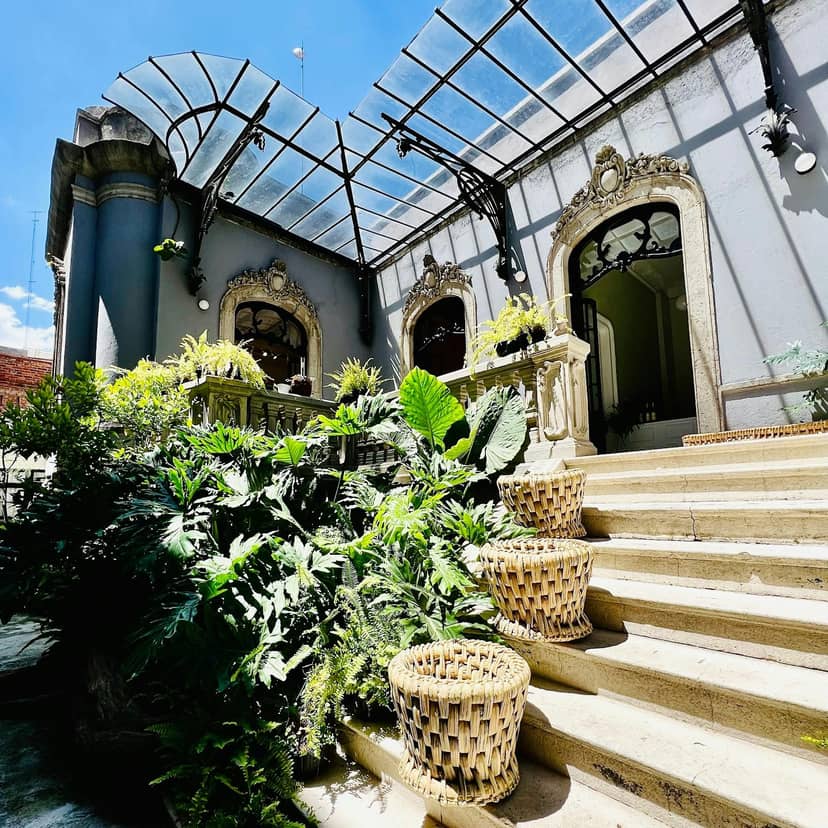 Boutique venue at Fundación MARSO with glass atrium for micro-weddings and cocktail receptions.