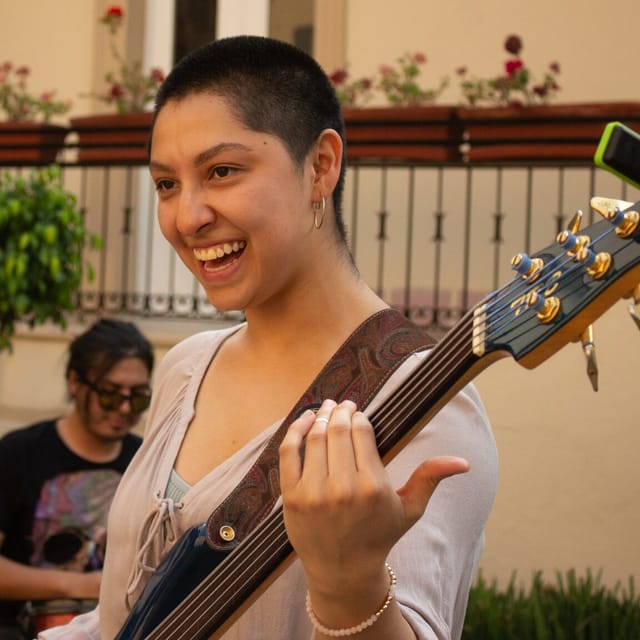 Acoustic performer at Casa Rafael Galván, ideal for cocktail receptions and networking events.