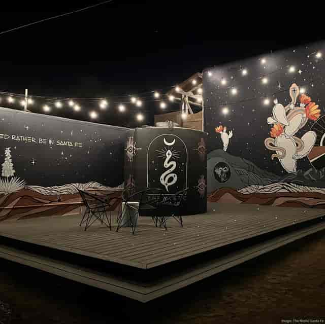 High Desert Hideaway outdoor networking space with bistro lighting for intimate corporate events.