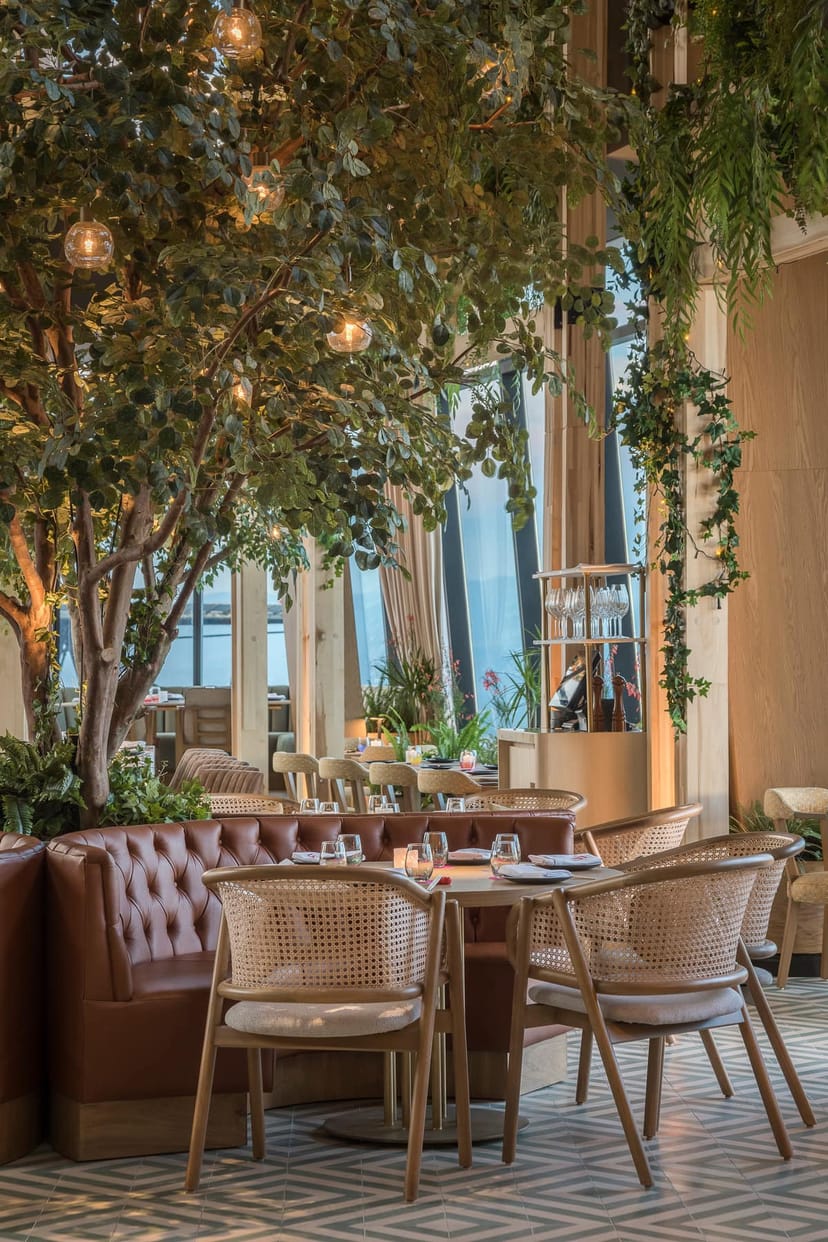 Ling Ling Mexico City terrace: biophilic networking event space with upscale leather seating.
