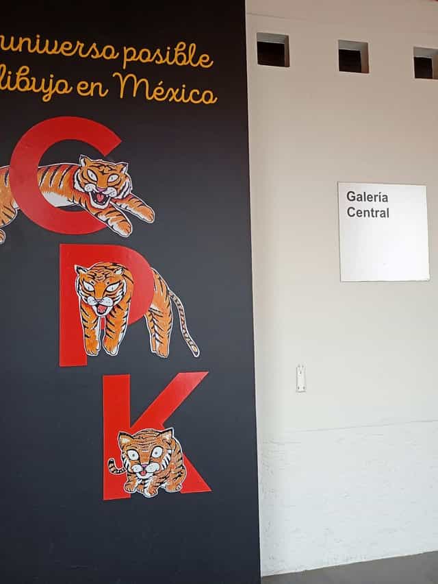 Wayfinding signage for Galería Central museum event navigation.