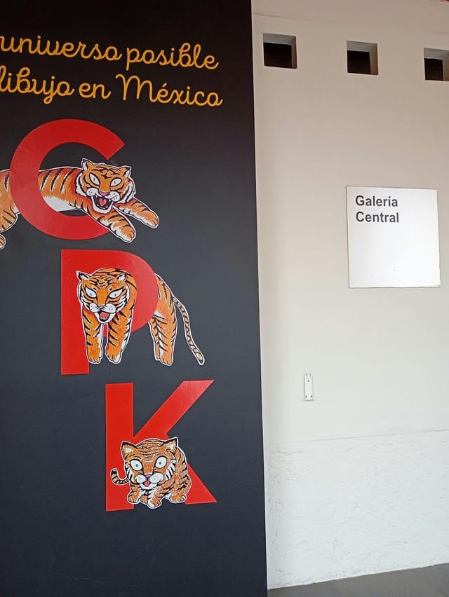 Wayfinding signage for Galería Central museum event navigation.