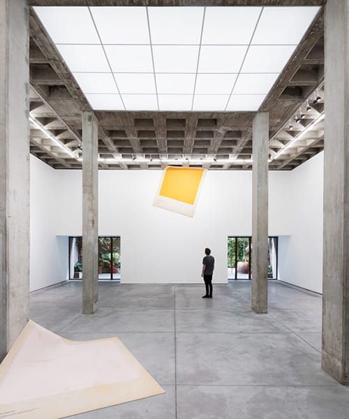Industrial art gallery venue with high ceilings for minimalist product launches and activations.