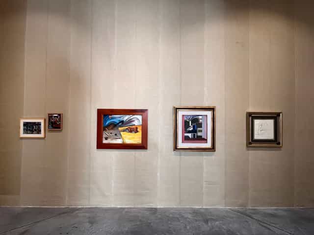 Industrial art gallery venue with lighting design for corporate events and exhibitions.