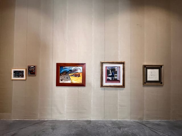 Industrial art gallery venue with lighting design for corporate events and exhibitions.