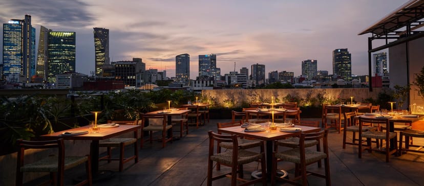Contempo Queen Terraza rooftop at golden hour, perfect for upscale welcome receptions and networking.
