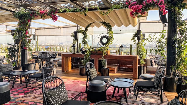 Maison Mexico Roma rooftop venue with lounge seating for corporate mixers and social gatherings.