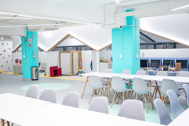 Modern BOK Ludoteca meeting space and kids' play area for family-friendly corporate events.